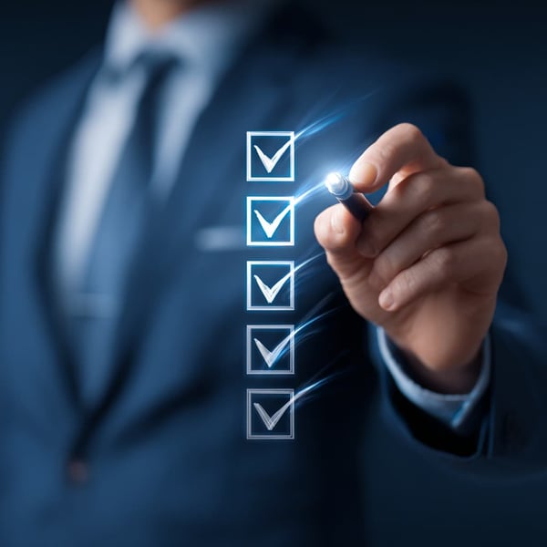 Business professional checking off items on a digital checklist interface, symbolizing success and achieved results.
